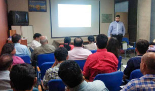 Dr._Dhyan_Patel_delivering_talk_Wagh_Bakri_House.